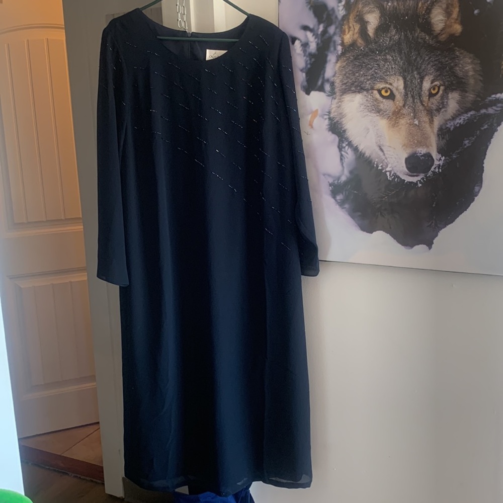 Leandra size 16 dress navy blue in colour beads seven across chest